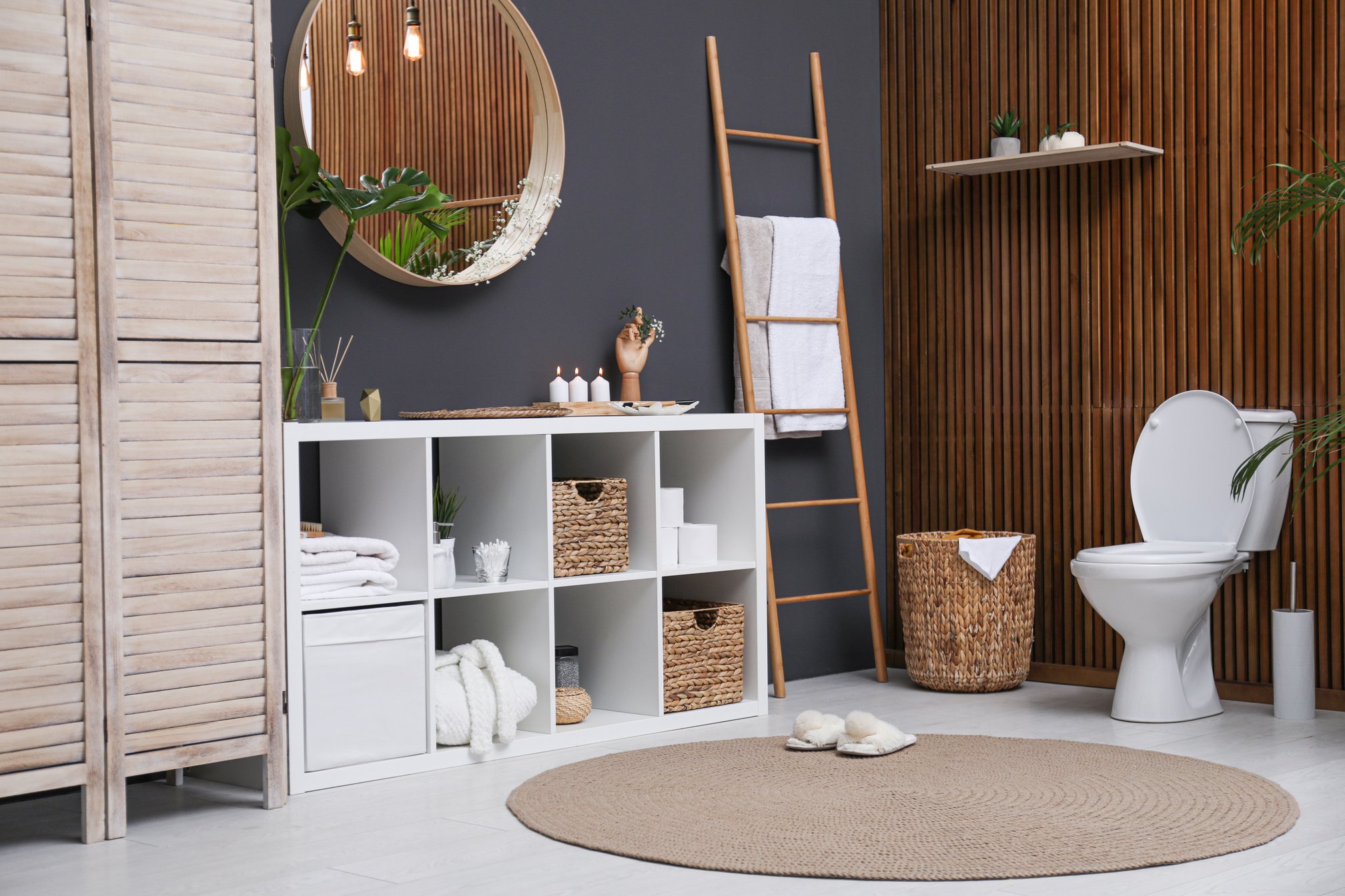 Interior of Modern Bathroom with round Mirror